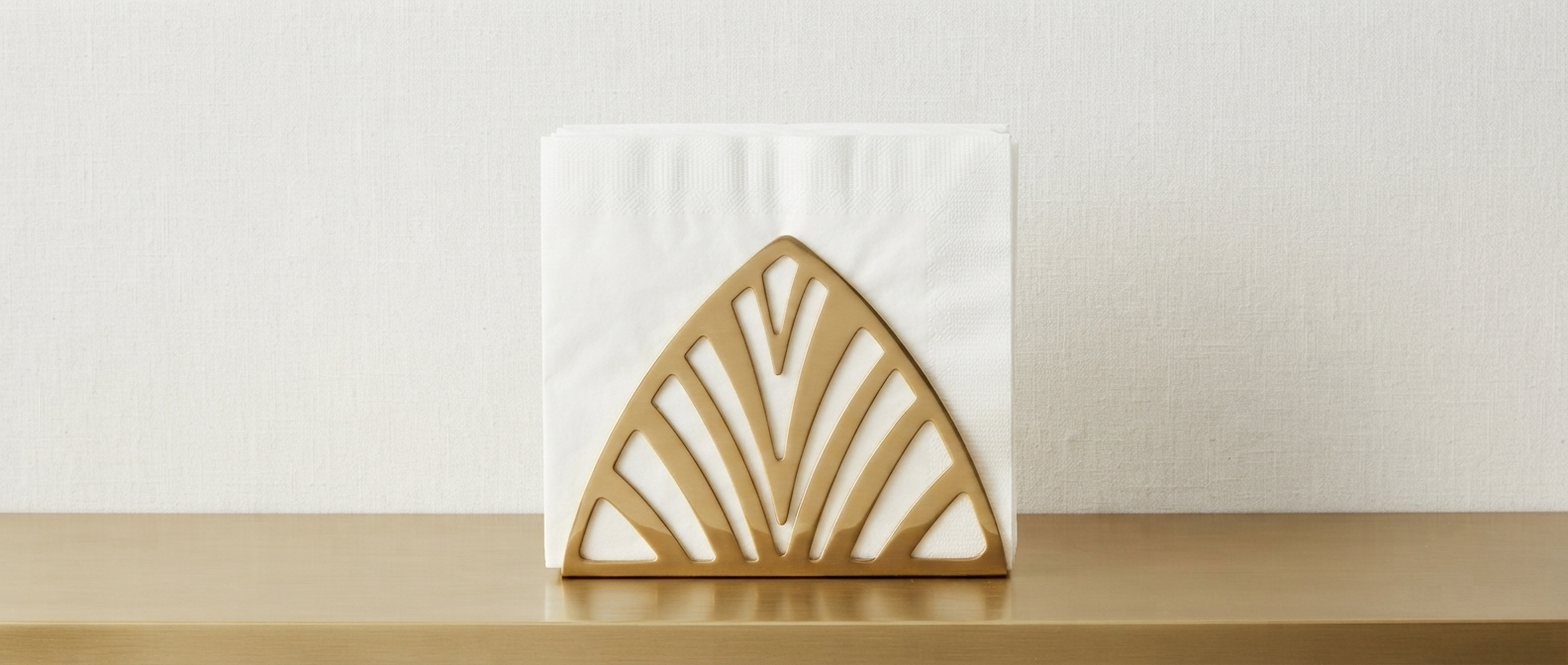 Wholesale brass napkin holders handcrafted by OneTrend, Indian manufacturer and exporter supplying premium brass table accessories to importers, wholesalers, retailers, and hospitality buyers in the USA