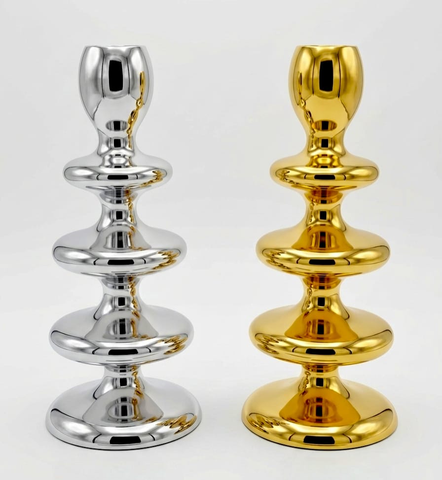 Modern sculptural metal candle holder in gold and silver finish