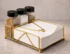 Brass napkin holder with condiment caddy for restaurants