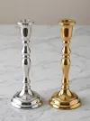 Classic metal taper candle holder in gold and silver plated finish