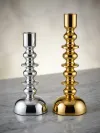 Contemporary metal pillar candle holder in premium gold and silver finish