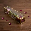 Luxury glass rose box with golden metal frame for elegant home decor and flower display