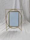 Modern geometric metal photo frame with gold finish for home décor