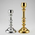 Classic metal taper candle holder in polished gold and silver finish