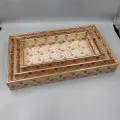 Decorative serving tray set with geometric gold pattern for luxury home décor