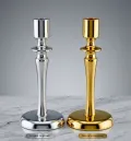 Luxury metal taper candle stand in polished gold and silver finish