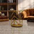 Handcrafted metal pen holder with gold geometric design for wholesale office accessories and global export markets.