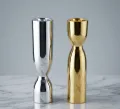 Minimalist metal taper candle holder in polished gold and silver finish
