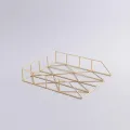 Modern brass decorative serving tray with geometric wireframe design