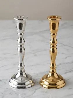 Classic metal taper candle holder in gold and silver plated finish