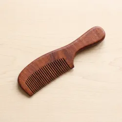 Ergonomic wooden handle hair comb manufactured in India for salons and retailers