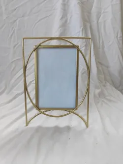 Modern geometric metal photo frame with gold finish for home décor