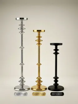 Tall decorative metal pillar candle holder in silver, gold, and matte black finishes